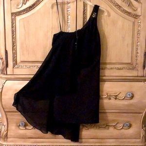 Bebe one shoulder black dress with chiffon overlay. New with tags. Size Small.